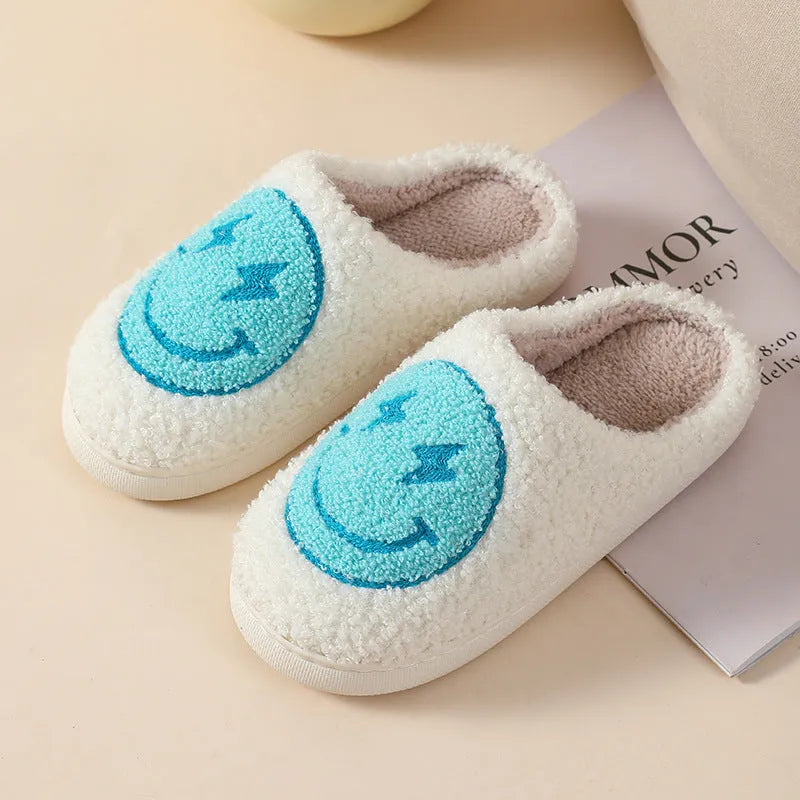 Adult women's plush home slipper in a cartoon love design with a round toe and non-slip PVC sole.