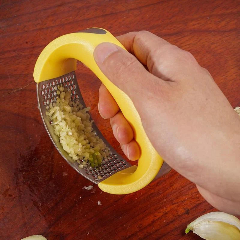 Stainless steel garlic press with non-slip handle for easy crushing