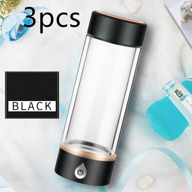 Portable hydrogen water ionizer bottle with high borosilicate glass cup in silver finish.