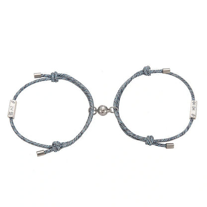 Magnetic couple's bracelet with geometric design and meaningful charms inspired by ancient Chinese tradition