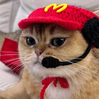 Handmade knitted cotton sweater and chef hat costume on a small cat or dog