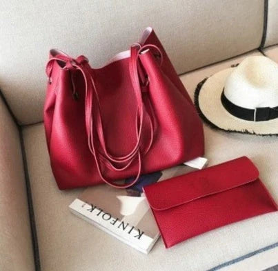 Stylish crossbody handbag in various colors, featuring a reversible design, detachable strap, and organized interior pockets
