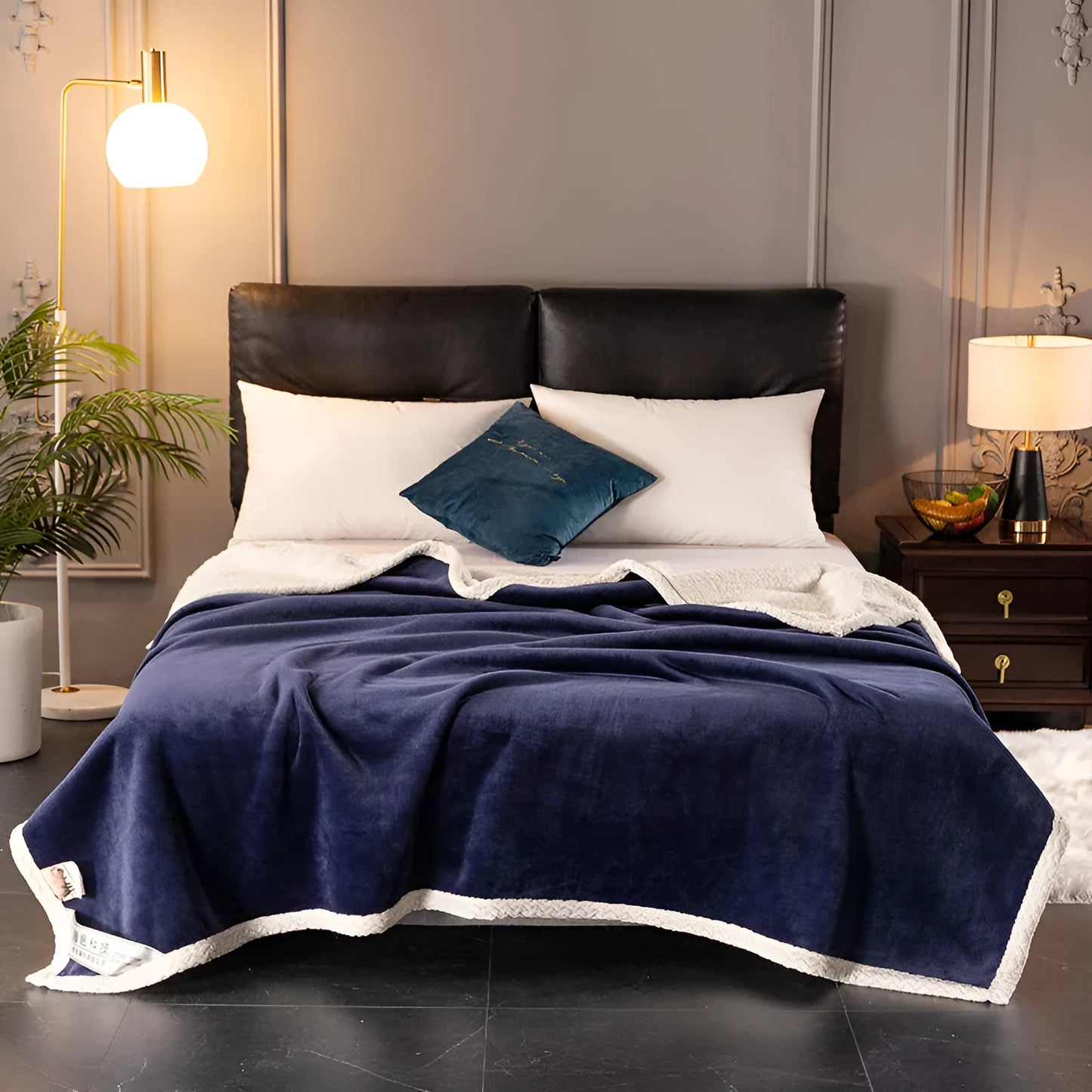 A thick, plain coral fleece blanket in a choice of colours, folded to show its texture.