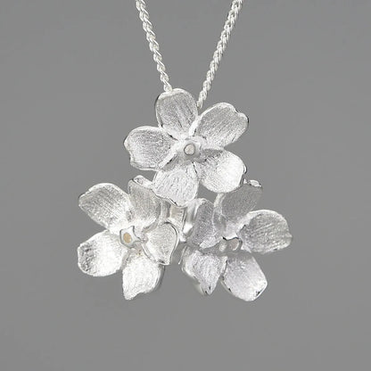 Myosotis Sylvatica sterling silver floral pendant with open mouth design in pastoral style