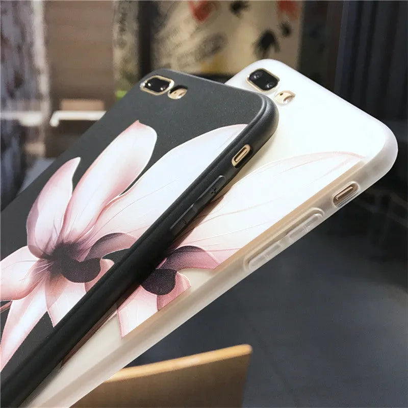 Embossed floral TPU phone case in black and white colour options showing floral pattern detail.