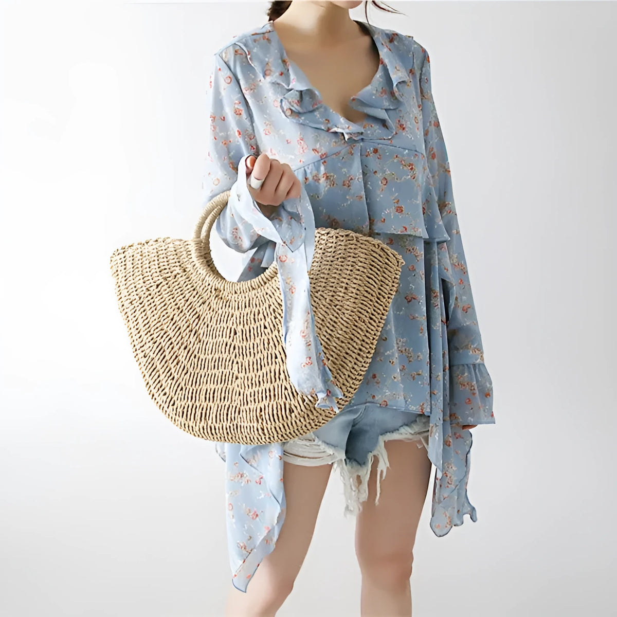 Woven paper rope and straw crescent handbag in natural light brown with hard handle and drawstring closure
