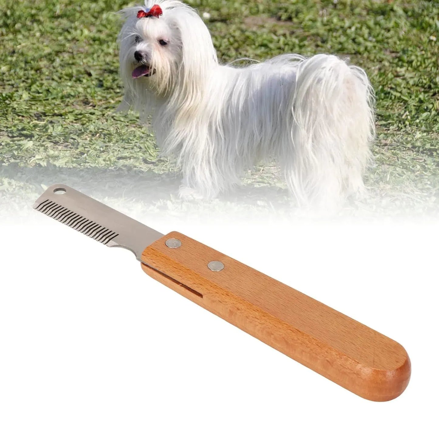 Dog stripping comb grooming tool with wood handle and metal blade for removing hair.