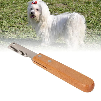 Dog stripping comb grooming tool with wood handle and metal blade for removing hair.
