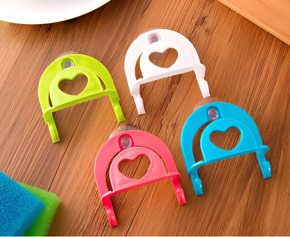 Plastic hook sponge storage rack with suction cups in pink, blue, green, white colours