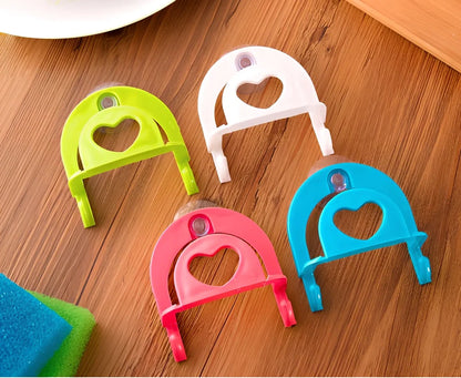 Plastic hook sponge storage rack with suction cups in pink, blue, green, white colours