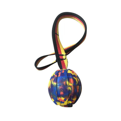 Yellow and camouflage coloured EVA foam floating dog balls with strings in 6.5cm, 7cm, and 9cm sizes.