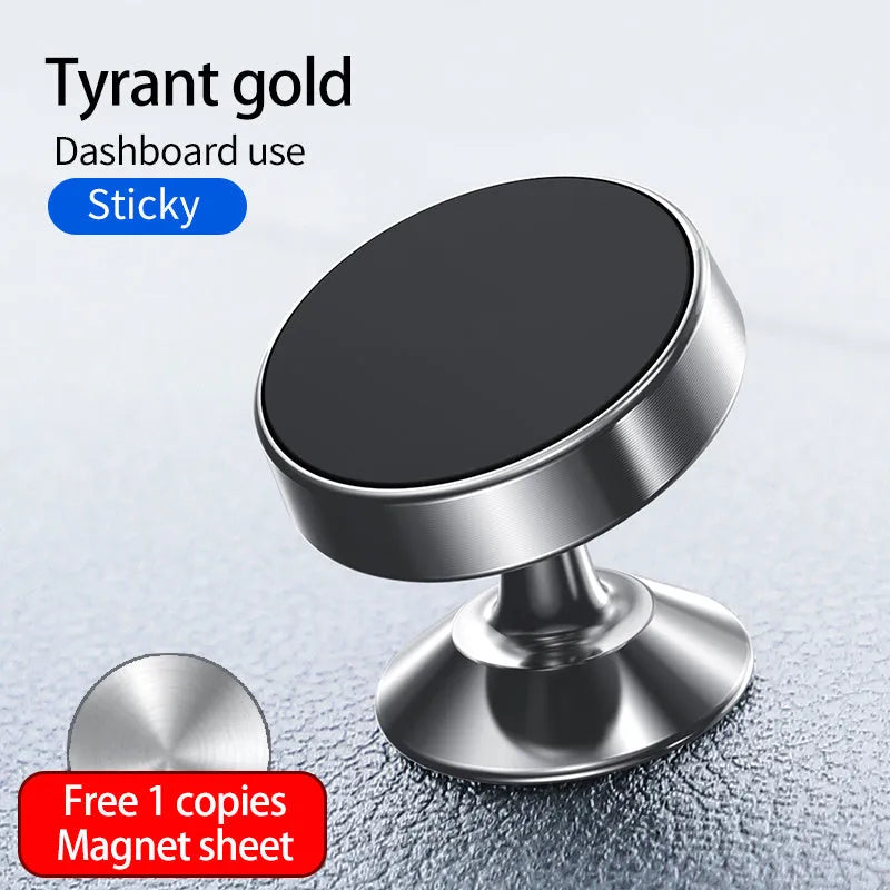Magnetic car phone holder mounted on dashboard showing smartphone attachment and 360-degree rotation mechanism