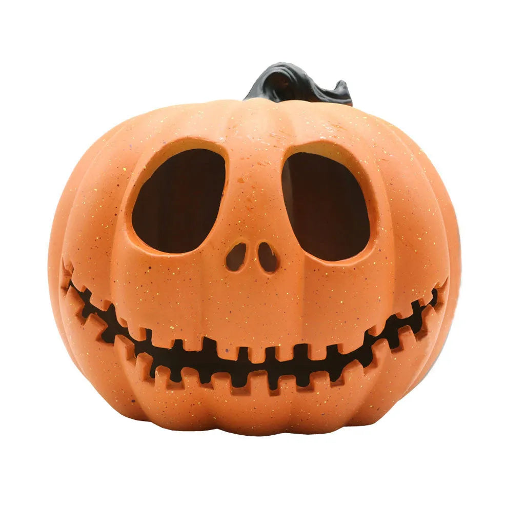 Yellow Halloween pumpkin lantern with hollow-out skull hooded design, resin prop measuring 23 x 19cm