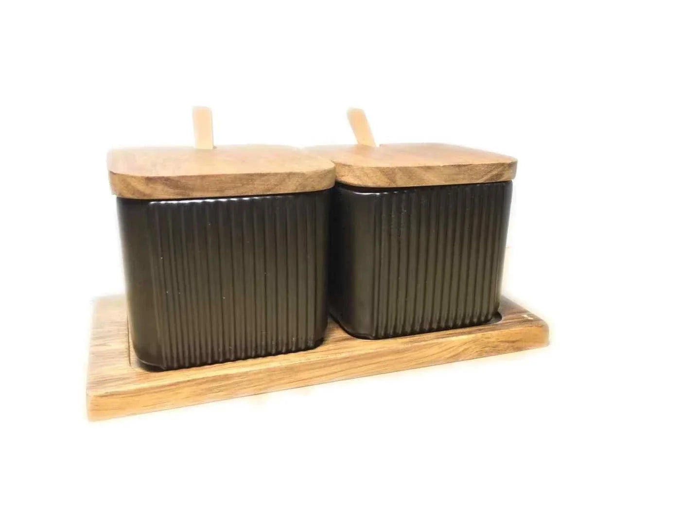 Stylish ceramic seasoning jars in a modern kitchen setting, featuring a matte glaze finish and a variety of color options.