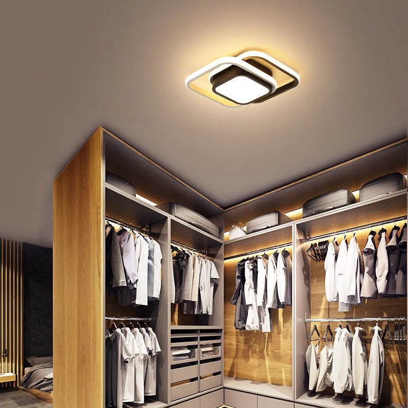 Modern geometric aluminium ceiling light in round and square styles with LED illumination.