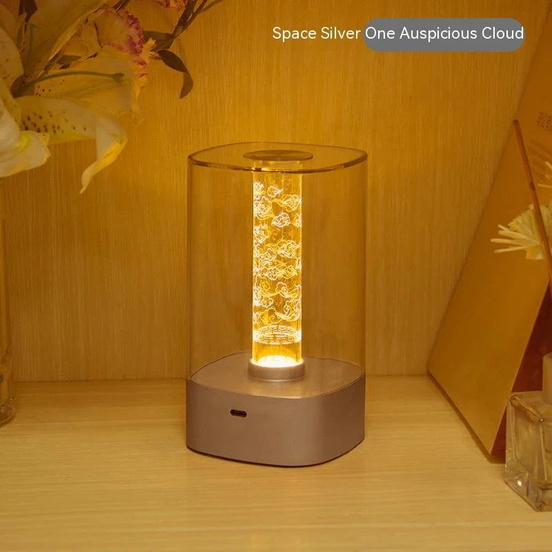 Elegant touch-controlled bedside lamp with soft, warm lighting, unique lamp post design, and wireless USB charging