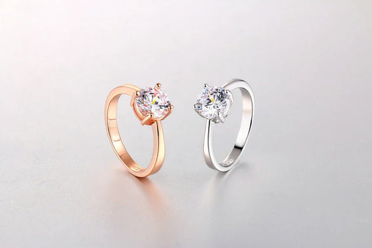 Close-up of a beautiful rose gold ring with sparkling zircon stones