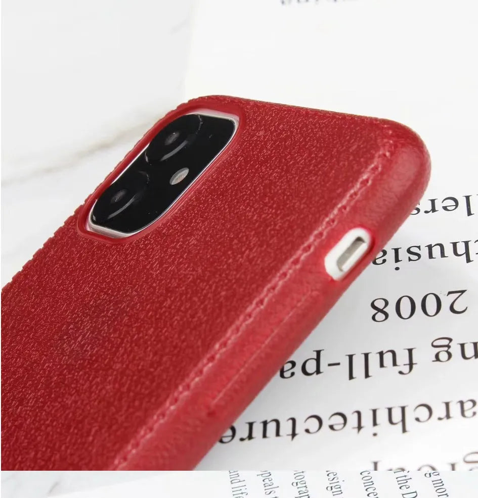 Leather-textured TPU phone case for iPhone in black, brown, navy blue, or wine red colour options.