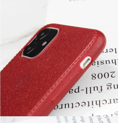Leather-textured TPU phone case for iPhone in black, brown, navy blue, or wine red colour options.