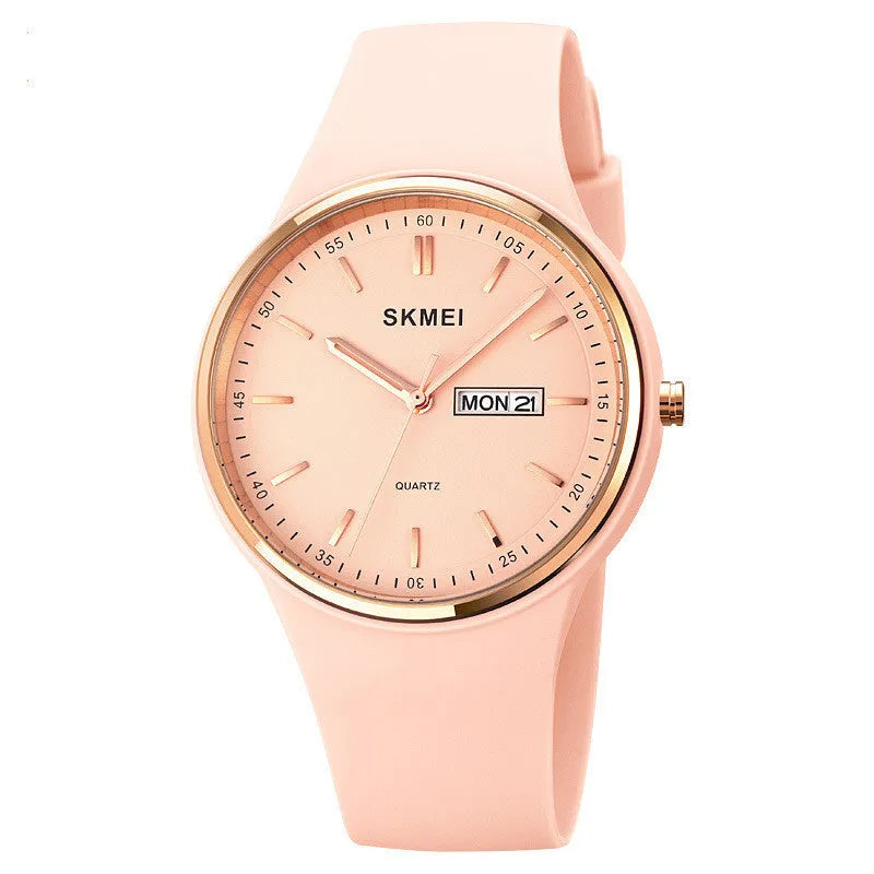 Women's quartz watch with a silicone strap and calendar on a 42mm white dial.