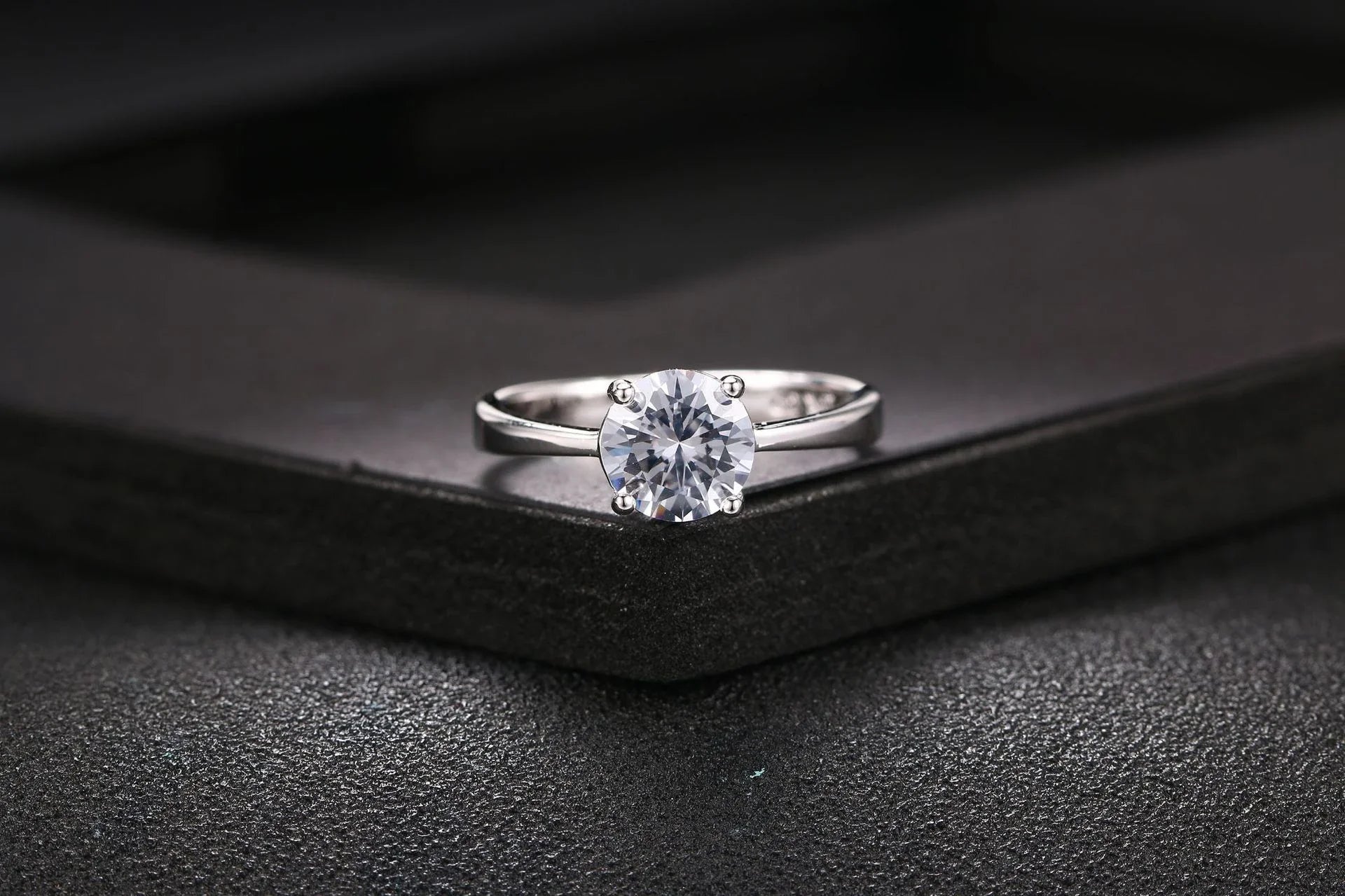 Close-up of a beautiful rose gold ring with sparkling zircon stones