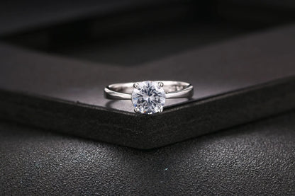 Close-up of a beautiful rose gold ring with sparkling zircon stones