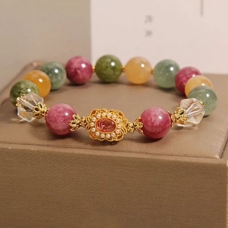 Jade colour tourmaline and alloy bracelet for women with pearl crystal base and rhinestones.