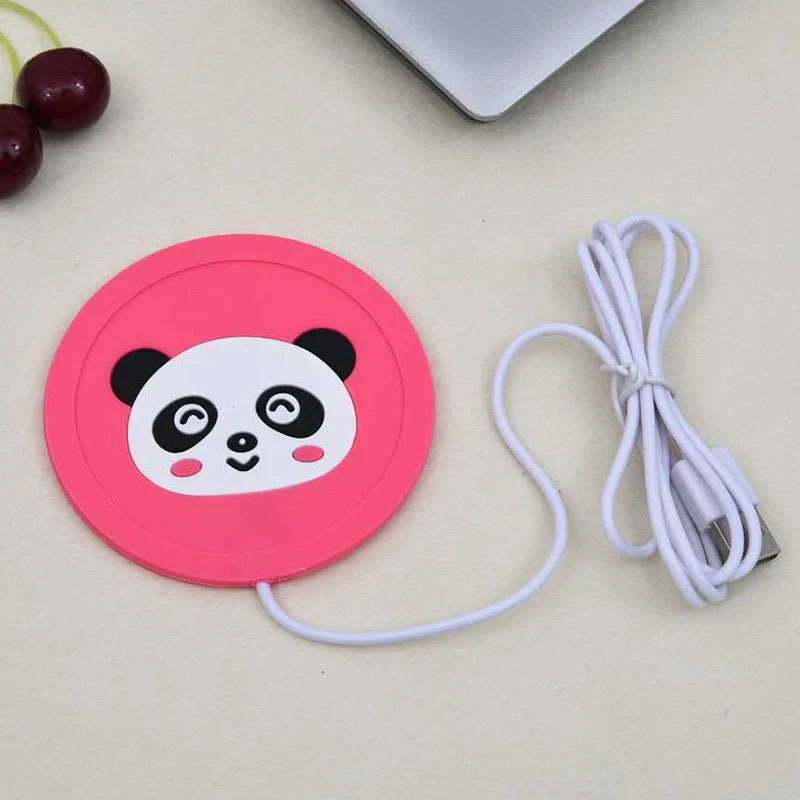 Cosy USB-powered heating pad with a soft rubber construction and a playful animal-inspired design, perfect for keeping mugs and cups warm