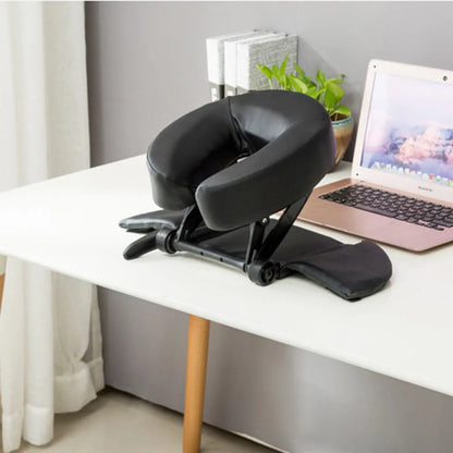 U-shaped black SPA facial massage pillow with adjustable height, shown with its zippered nylon carry case