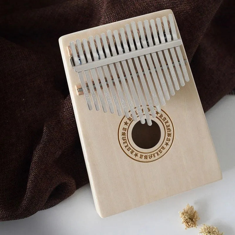 Basswood beginner thumb piano kalimba with no-lacquer finish, available in seven styles including Clouds and Gothic.