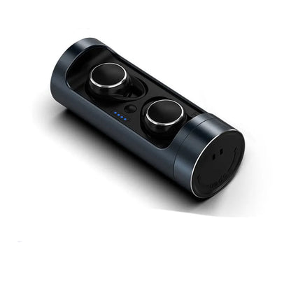 Dark Grey wireless Bluetooth headset with charging bay on a table.