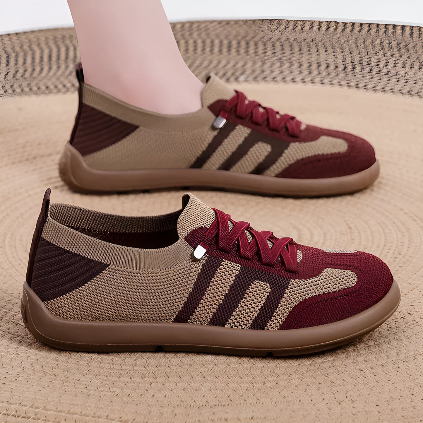 Retro style casual training shoes in flyknit mesh with a soft PU sole and flat heel.