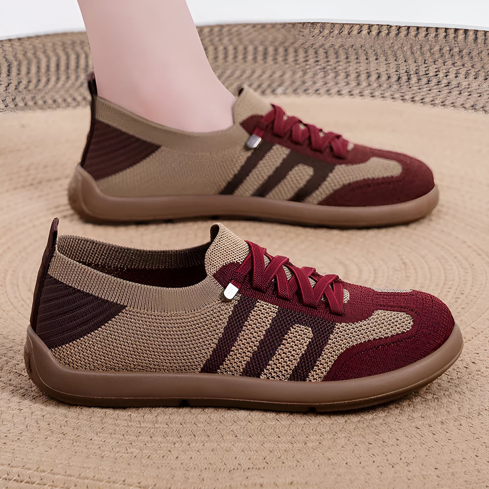 Retro style casual training shoes in flyknit mesh with a soft PU sole and flat heel.