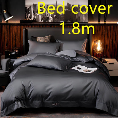Four-piece cotton bedding set with satin weave fabric showing quilting detail and colour options