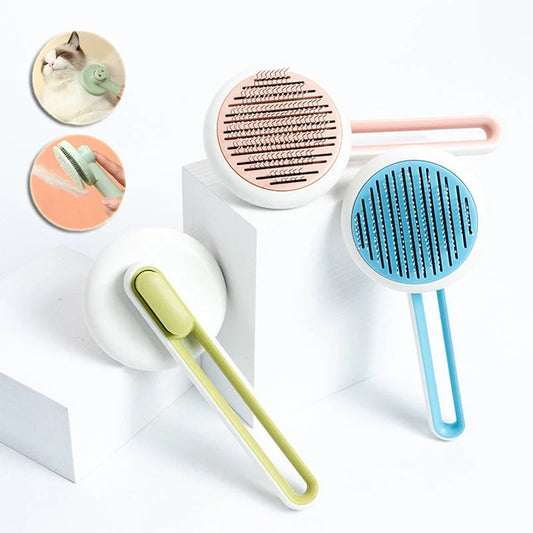 Automatic pet hair remover brush in pink, blue, and green with stainless steel pins