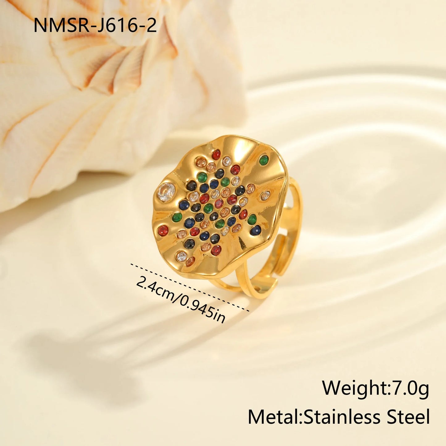 Geometric open-mouth stainless steel ring with pleated inlaid colour diamonds on a white background.