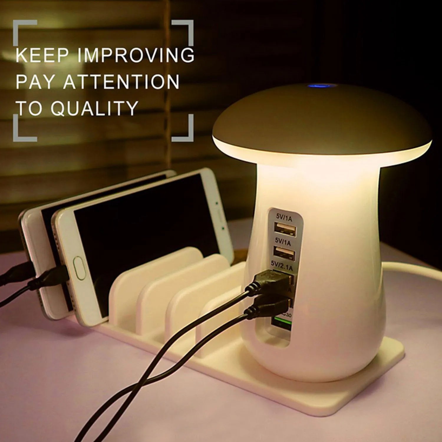 White mushroom-shaped USB charging dock station with 5 ports and an illuminated LED night light on a wooden desk.