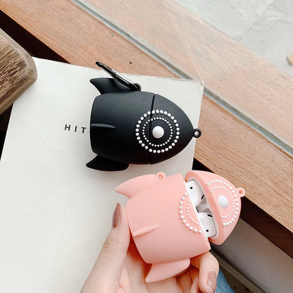 Pink silicone protective cover on an AirPods charging case.