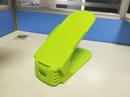 Adjustable dual-tier shoe organizer rack made of durable polypropylene material