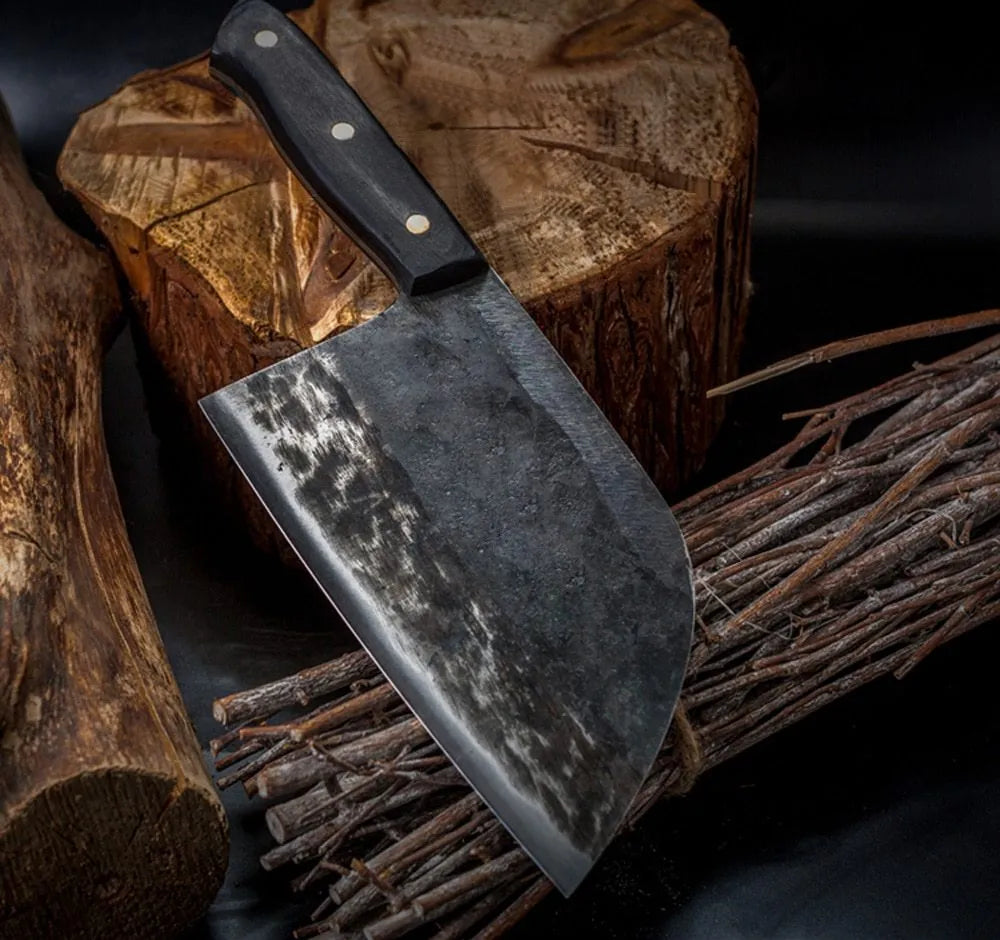 Hand-made stainless steel meat cleaver with a 17cm round head blade on a kitchen surface.