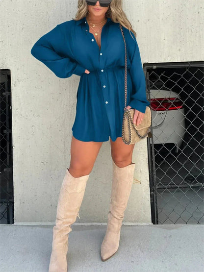 A stylish long sleeve jumpsuit with a button-up shirt design, available in a variety of vibrant colors.