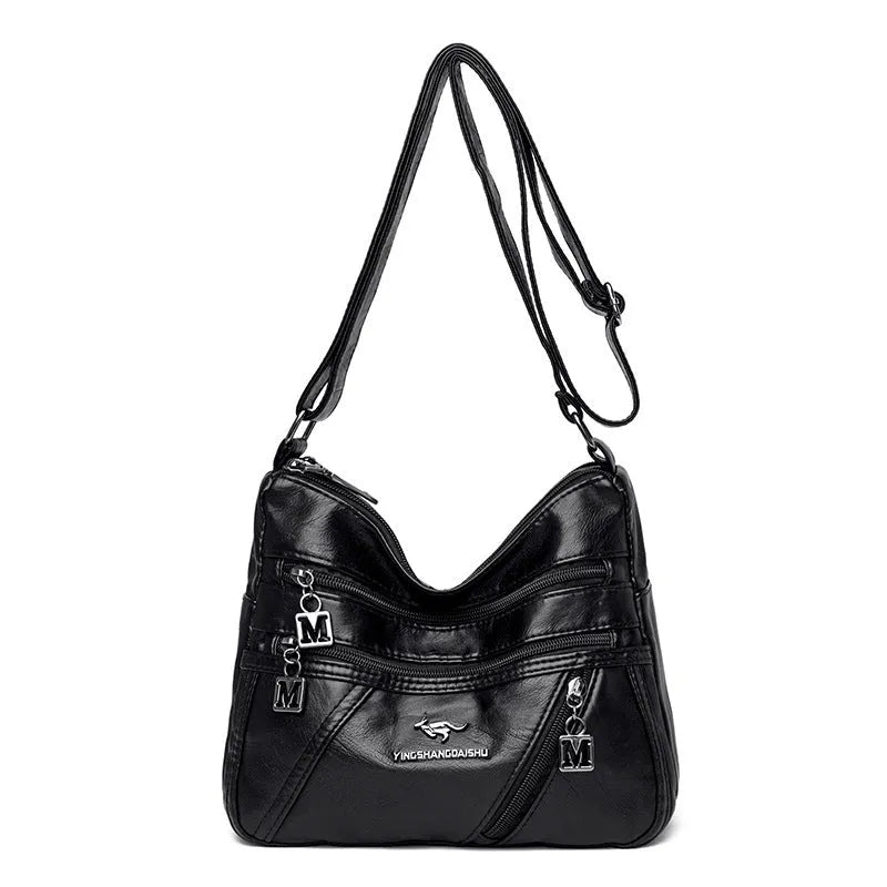 Middle-aged women's double layer PU shoulder bag with large capacity, welt pocket, and soft build in red, purple, dark blue, black, bronze, gray, or tan.
