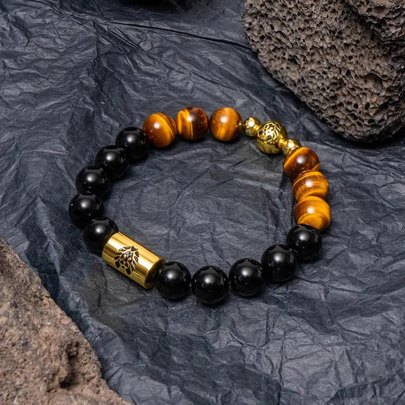 Little Lion ethnic geometric bracelet made from brown Bodhi seed beads on a wrist.