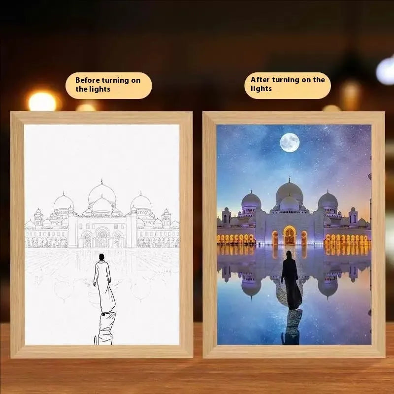 Modern rectangular light painting photo frame displaying an illuminated cross and scenic artwork.