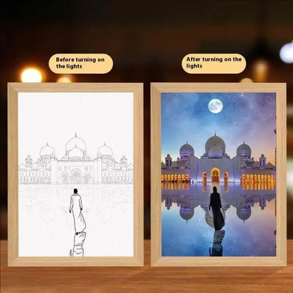 Modern rectangular light painting photo frame displaying an illuminated cross and scenic artwork.