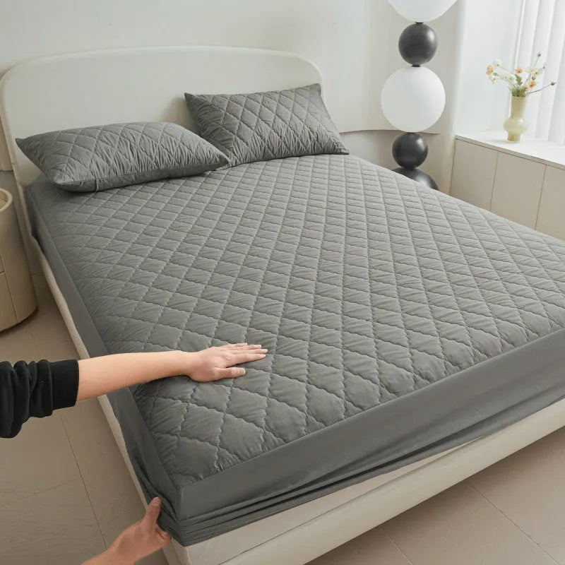 Diamond lattice quilted waterproof mattress protector set in black, grey, pink or white with fitted sheet and pillowcases