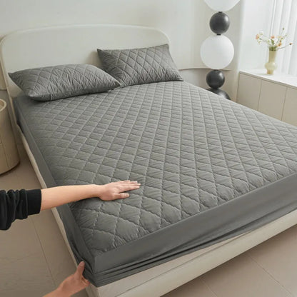 Diamond lattice quilted waterproof mattress protector set in black, grey, pink or white with fitted sheet and pillowcases