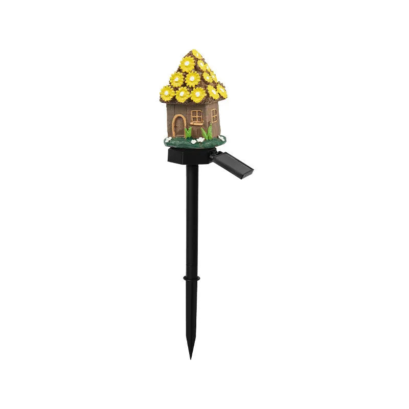 Flower-shaped solar garden light with resin housing for outdoor decorative lighting.