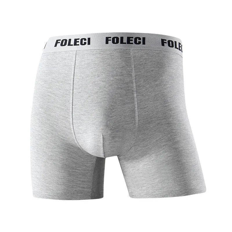 Men's pure cotton lengthened boxer briefs with anti-wear legs and high waist, available in five solid colours, sizes XL to 8XL.