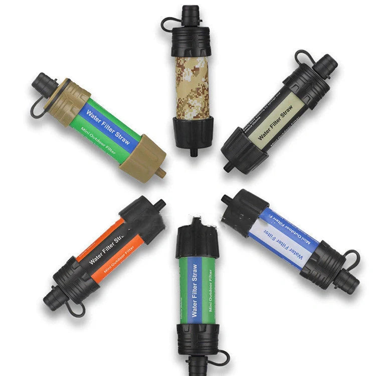 Compact portable water purifier straw with filter for outdoor adventures and emergencies.